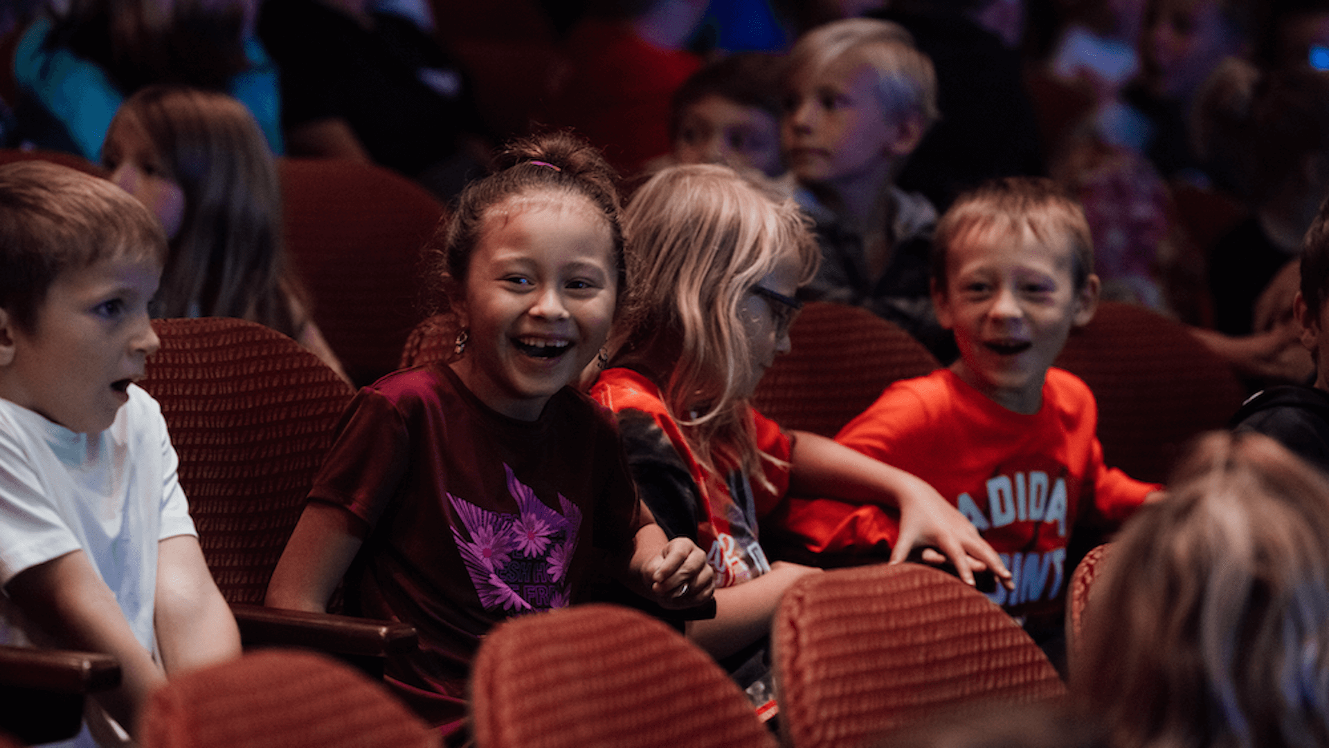 Children sitting in Gallagher Bluedorn seats