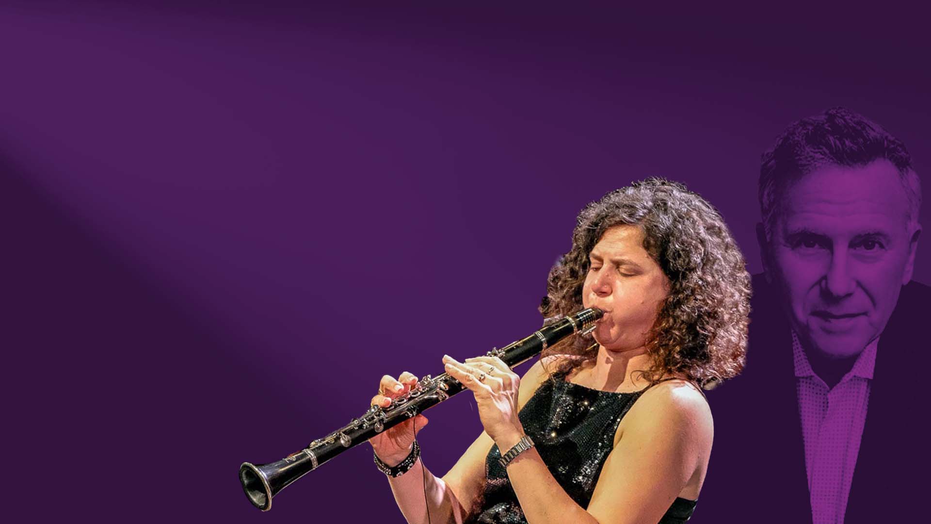 Purple gradient background with Anat Cohen playing clarinet and Paul Reiser in the background