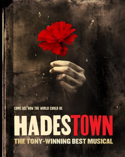 A hand holding a rose. Text reads: HADESTOWN