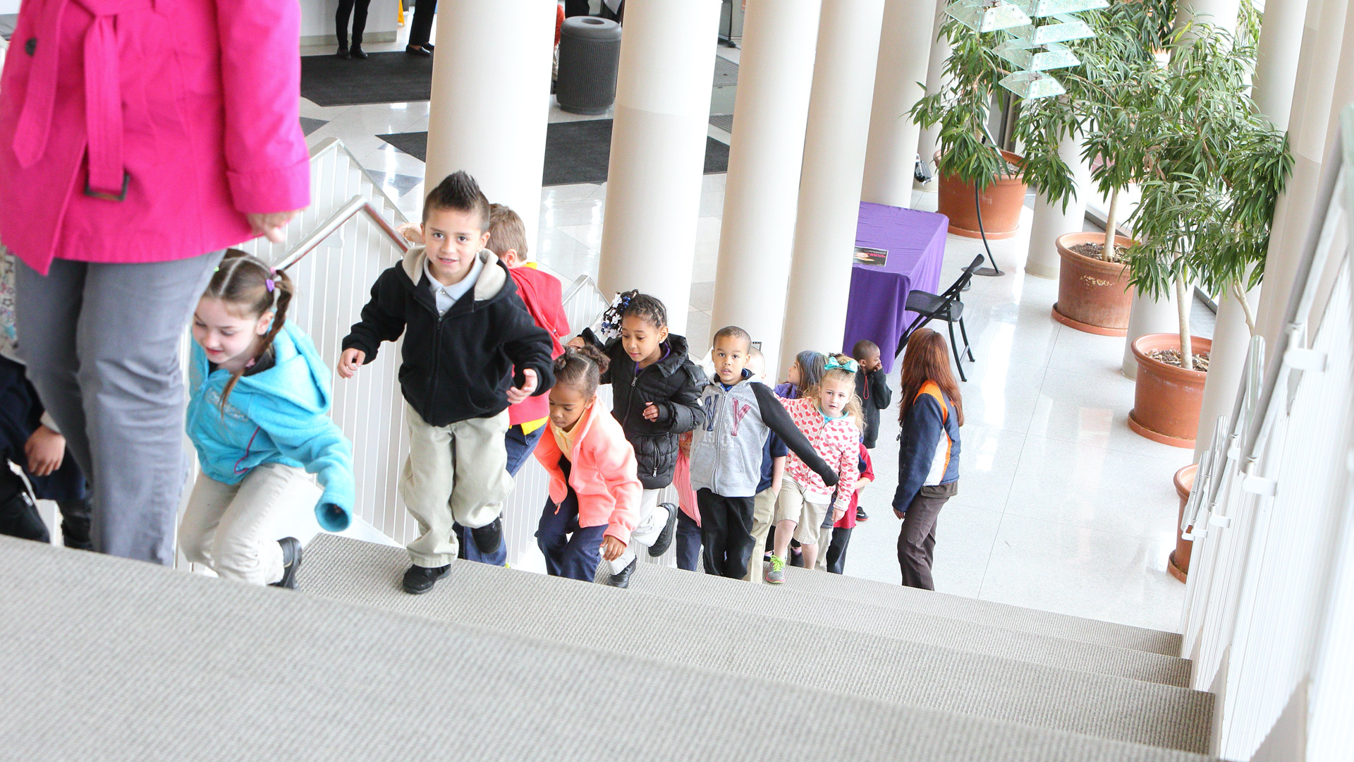 Kaleidoscope Kids Going Up Stairs