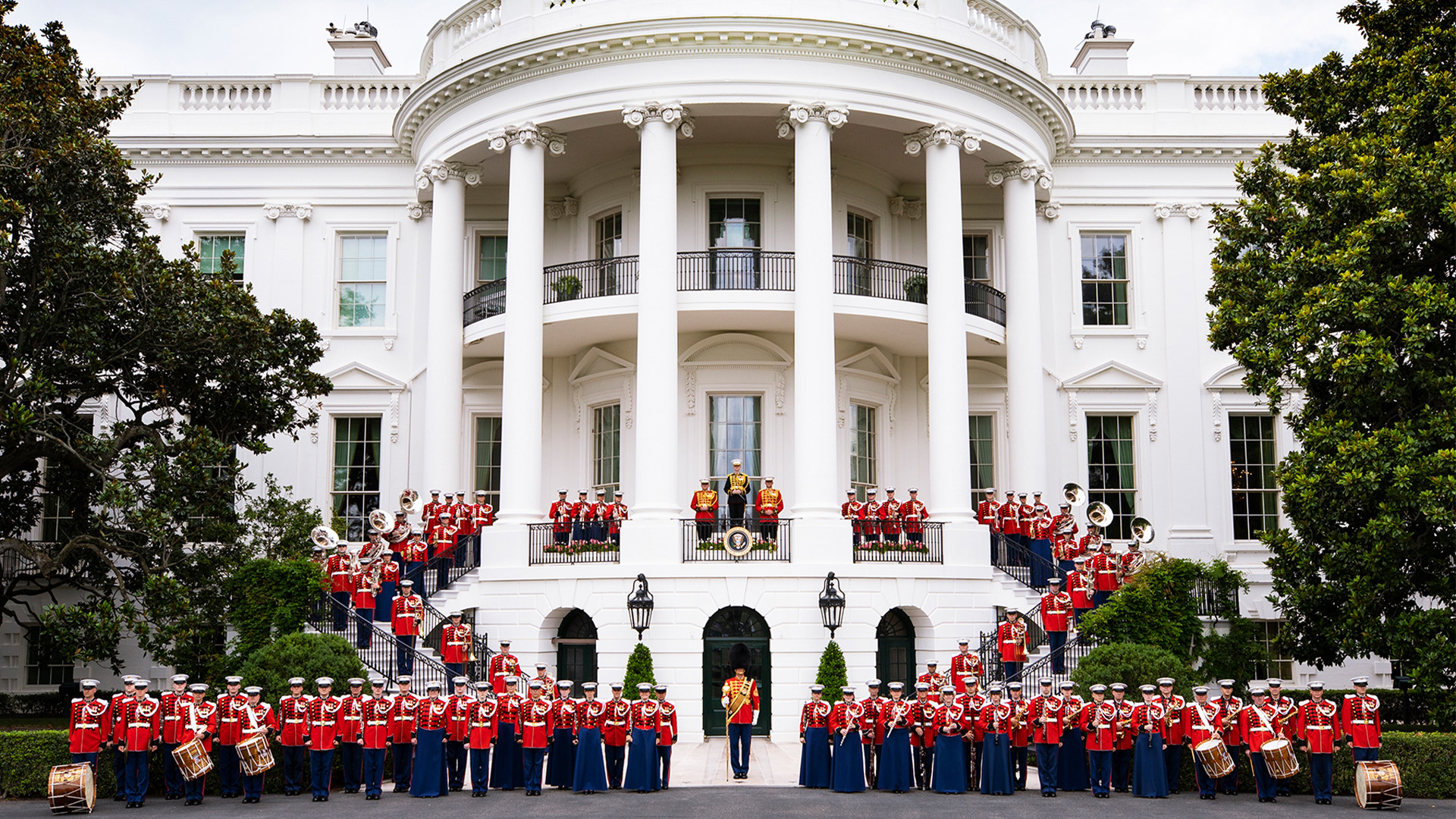 Band in red uniforms at The White House