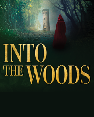 caped person in woods