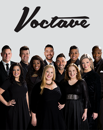 11 members of Voctave all wearing black and smiling at the camera.